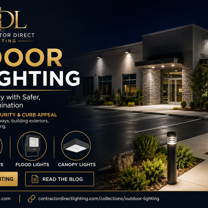 Commercial building illuminated at night with LED wall packs, area lights, flood lights, canopy lights, and outdoor wall sconces from Contractor Direct Lighting.